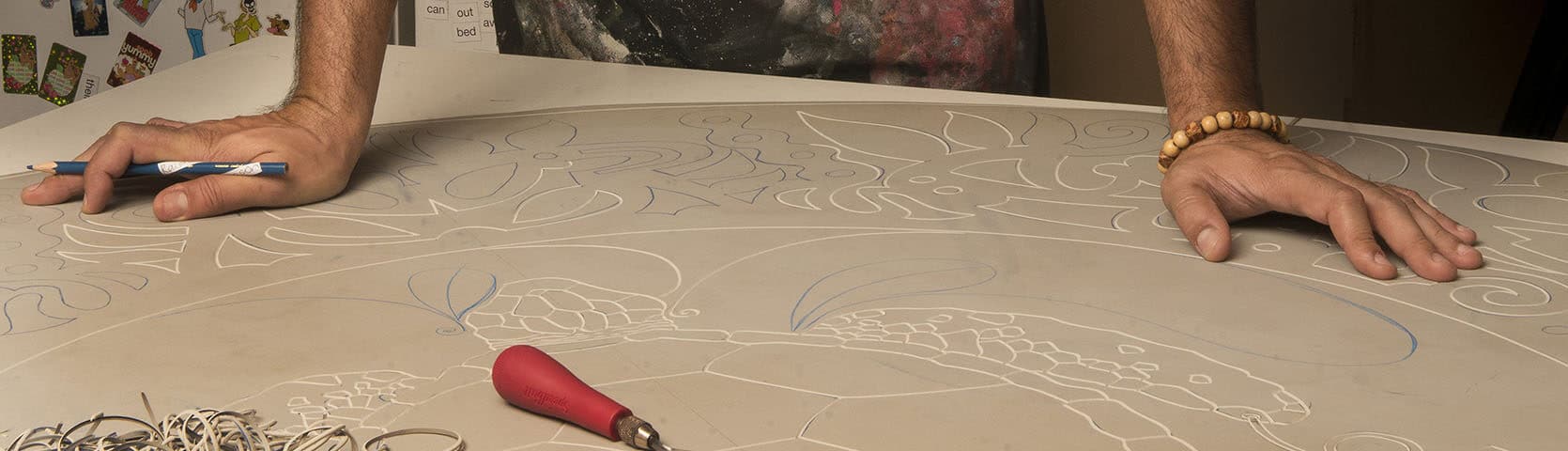 Brian Robinson designing Coral Expedition Logo